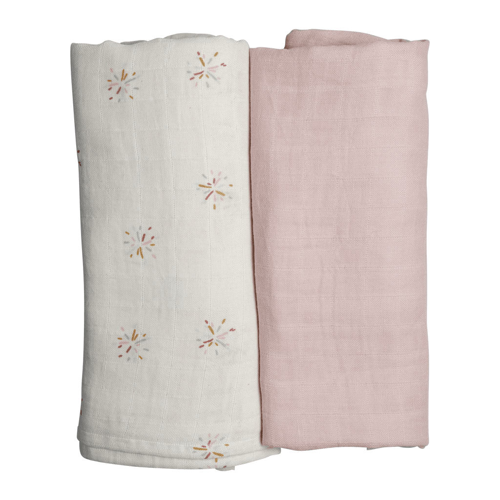 Coppia di copertine con colori abbinati (tinta unita una, fantasia di stelle su sfondobianco l'altra)Copertine/swaddle bianca e rosa arrotolate