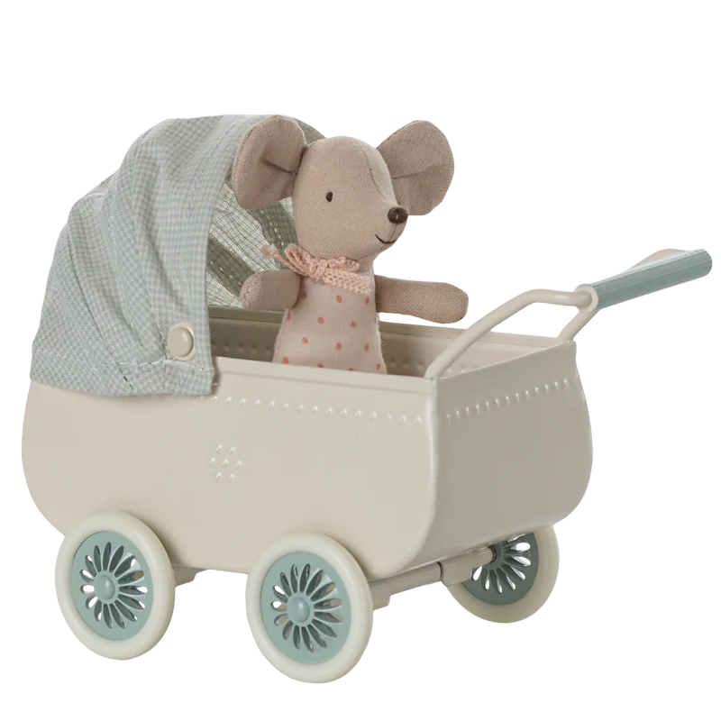 Carrozzina color menta in metallo con baby topino