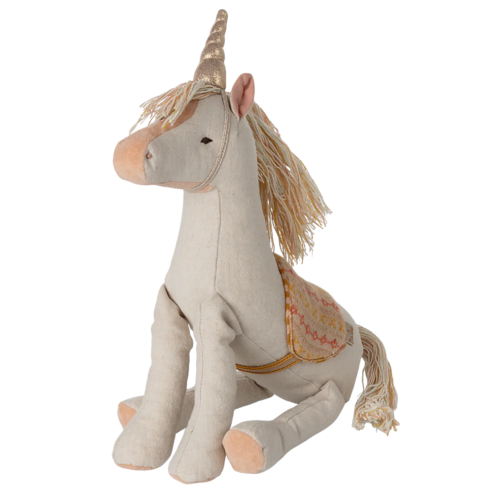 Unicorno di peluche con corno dorato e sella decorata