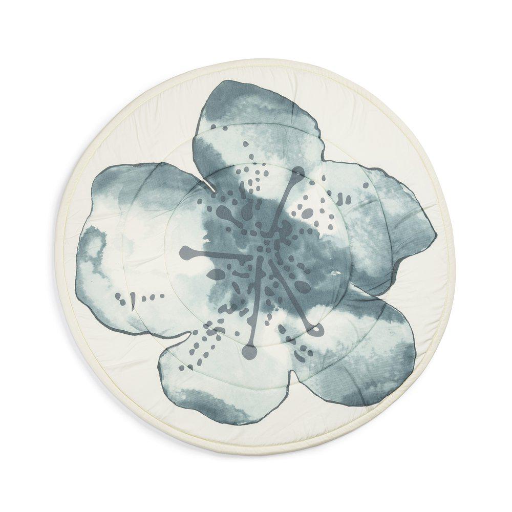 Tappeto gioco rotondo con disegno acquarello di un grande fiore color petrolio